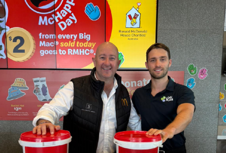 LogiPlan and a McDonald’s franchisee collecting donations for Ronald McDonald House Charities on McHappy Day